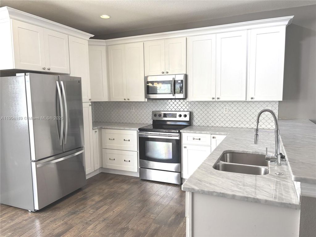 Photo of 150 Regions Way, Jupiter, FL 33458 (MLS # A11904189)