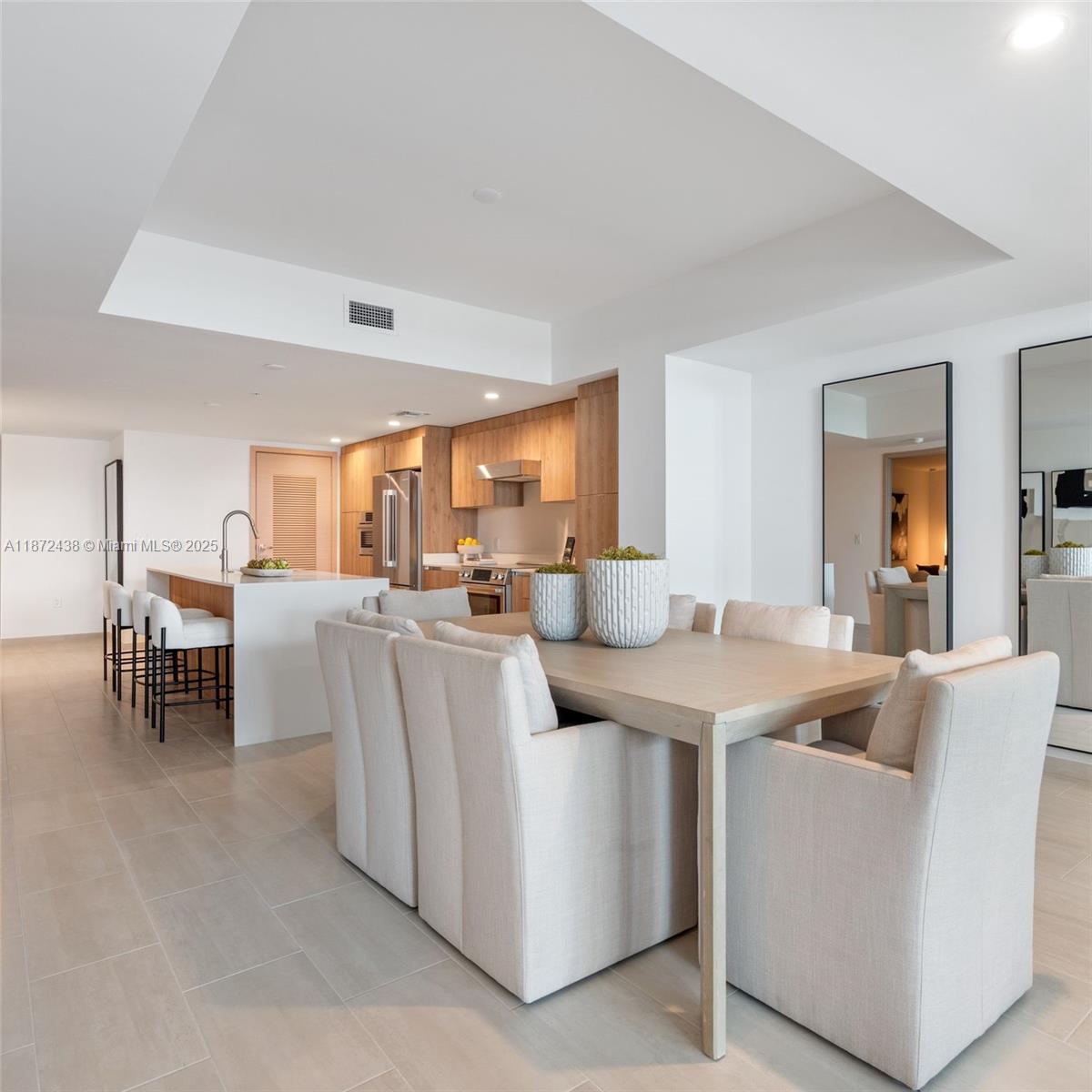 New construction on Bay Harbor Island, where space is a rare luxury, offers the ultimate in island living. This stunning home features 2 spacious bedrooms, 2 beautifully designed bathrooms, and a serene balcony perfect for unwinding. The open-concept layout blends natural beauty with modern elegance, highlighted by floor-to-ceiling glass walls and premium finishes. This exceptional unit features a massive 705 SQFT private terrace—a rare find—ideal for entertaining, outdoor dining, or simply relaxing under the stars. Spa-inspired bathrooms add a touch of luxury, while amenities include a rooftop pool, private cabanas, jacuzzi, waterfall, entertainment area, Peloton-powered gym, and lush atrium for wellness and relaxation.