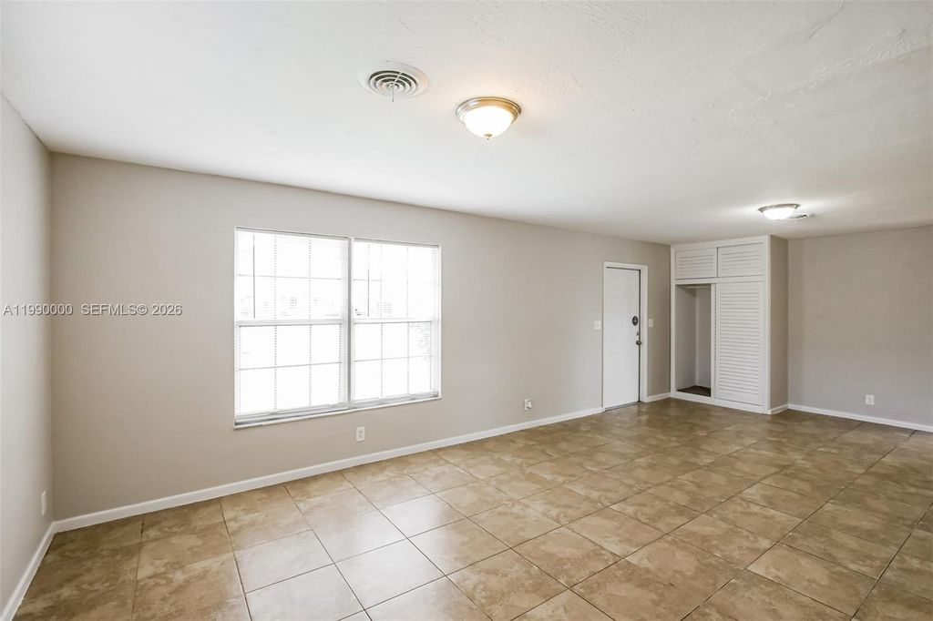 Photo of 5961 NW 14th Ct, Sunrise, FL 33313 (MLS # A11990000)