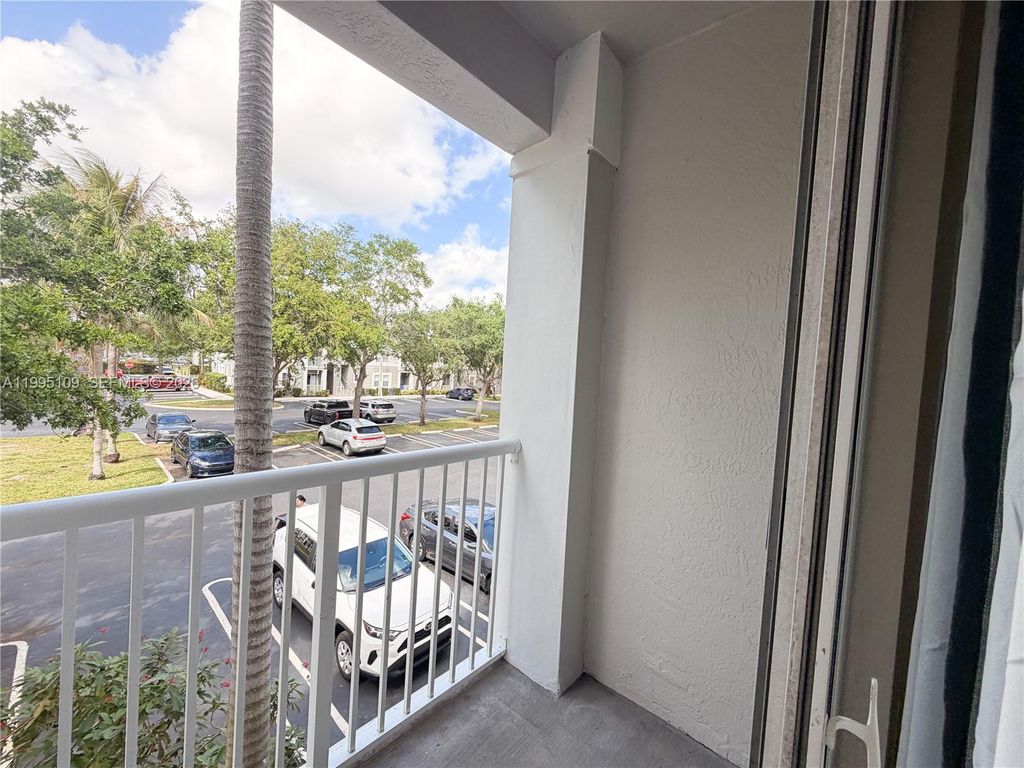 Photo of 2039 Shoma Dr #2039, Royal Palm Beach, FL 33414 (MLS # A11995109)