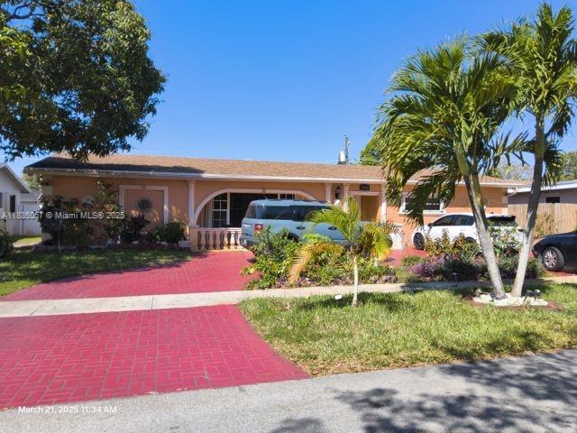 Beautifully updated 5Bed/3Bath 2,700sf home, situated on a large lot with a circular driveway and crystal blue large swimming pool and backyard shed. One of the bedrooms has a private entrance with private bath and Kitchenette for potentially additional income/in-law quarters. Centrally located very close to turnpike and offers easy access to major highways and nearby amenities and attractions. This home has a theater room, oversize laundry room, fireplace, and so much more. Relax and entertain in the private, spacious outdoor living area featuring a beautiful sparkling swimming pool. Text 863-484-4395 for faster response. No HOA and all credit scores considered. No Bankruptcy, No evictions. Will consider Good Section 8 Tenant with verifiable income and rental history Rapid approval