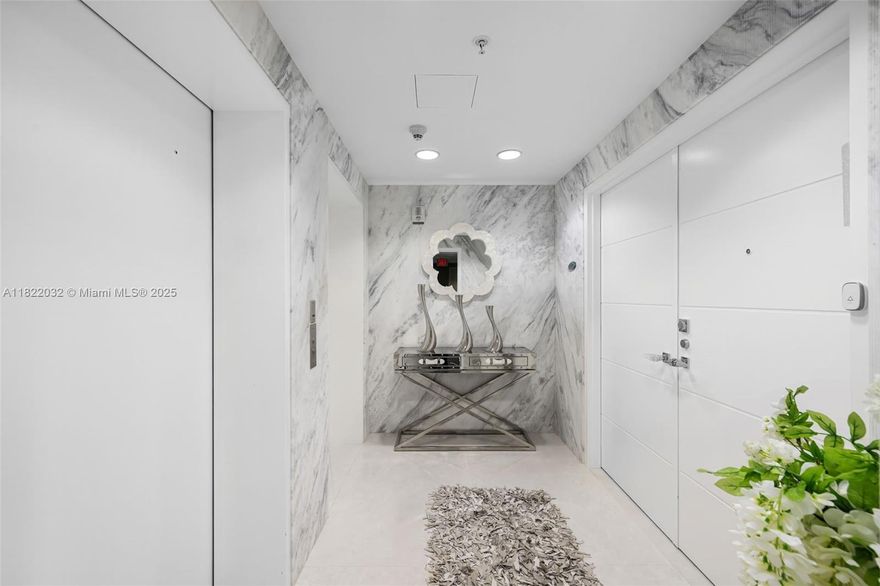 WOW! NEWLY RENOVATED!! MODERN & BEAUTUFULLY DESIGNED. 3 BEDROOMS, 3.5 BATHS. STUNNING DETAILS! A HOUSE IN THE SKY! LIKE NOTHING YOU HAVE EVER SEEN! STEP INTO THE BEAUTIFUL PRIVATE FOYER AREA ADORNED ELEGANTLY WITH BOOK MATCHED ITALIAN CUSTOM MARBLE.  BREATHTAKING ENDLESS OCEANVIEWS! OPEN & HUGE KITCHEN FEATURES A WATERFULL EDGE ISLAND, LED LIGHTING, ITALIAN CUSTOM DESIGNED WHITE LAQUERED CABINETS, & NEW APPLIANCES. MASTER BATHROOM IS LIKE YOUR OWN SPA W/ HIS AND HERS SHOWER AREA, ITALIAN STATUARY MARBLE SHOWER WALLS & FLOORS, SOAKING 71 INCH STONE TUB! TOTO REMOTE HEATED TOILETS! REMOTE CONTOLLED SHADES THROUGHOUT, MUST SEE THIS STUNNING RESIDENCE!  LAST BUT NOT LEAST -WE OFFER THE CHANCE TO OWN YOUR OWN PRIVATE 2 CAR GARAGE!!! COME & GO AS YOU PLEASE & GREAT FOR STORAGE TOO!! WATCH VIDEO!