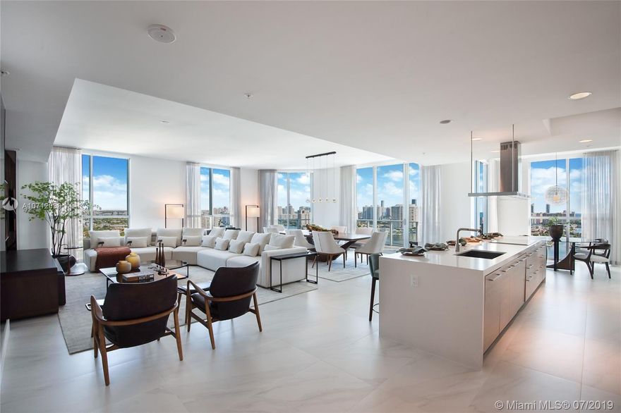 The Reserve at Marina Palms Penthouse 7 designed by Brazilian designer Saccaro. A magnificent turn key residence is 3,949 sq. ft.  3 bedroom 3.5 bath plus Den residence. Featuring a subdued feeling of warmth, curated by the water and surrounding views of idyllic sunsets and entertaining city lights, this is a lifestyle experience upon entering. On the first floor a Private Marina is one of the many amenities with slips from 40 - 90' and Boat Club with many choices of water sports. The amenities are astounding and include spa, kids play room, news cafe, valet, concierge and more with 2 parking spaces. Slips are also available for purchase.