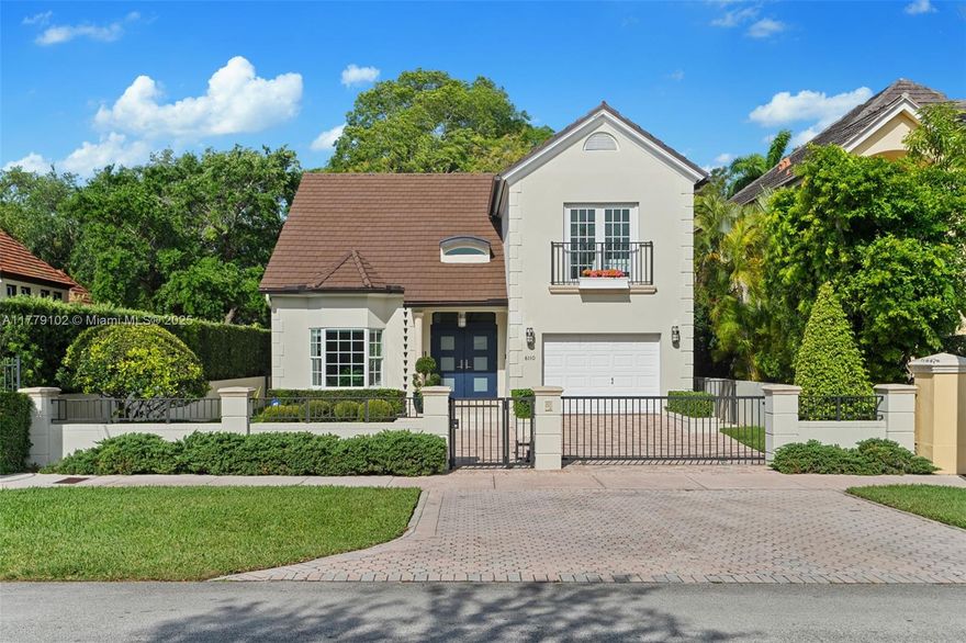 This timeless home in Coral Gables’ French Country Village blends classic design with luxury. The chef’s kitchen boasts Sub-Zero and Wolf appliances, custom Sky Gold Quartzite countertops, and vaulted ceilings. The master suite features a sitting area, walk-in closet, private balcony, and luxurious en-suite. Outdoors, enjoy a private pool surrounded by lush hedges. Additional highlights include a gated entry, impact windows, kitchen water purifier, and Nest-controlled HVAC system.
