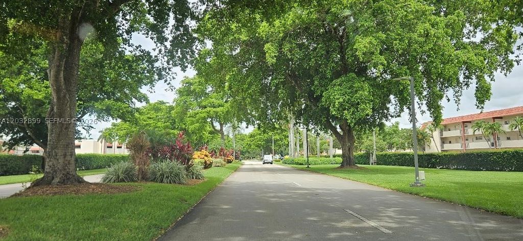 Photo of 9823 S Hollybrook Lake Dr #310, Pembroke Pines, FL 33025 (MLS # A12032899)
