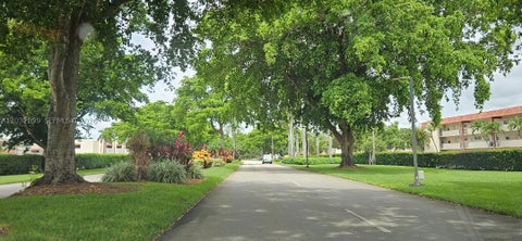 Photo of 9823 S Hollybrook Lake Dr #310, Pembroke Pines, FL 33025 (MLS # A12032899)