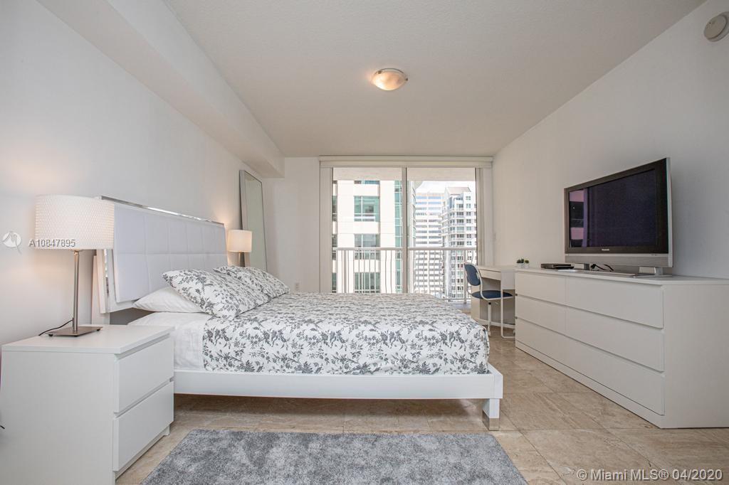 Comfortable apartment available for long and Mid- Term rental, overlooking the bay to a side view. Conveniently located at the heart of Brickell. Available immediately with fast approval. Nice and convenience high rise community with assigned parking in the garage and 24/7 Security Staff. Unit is completely and tastefully equipped and furnished: washer and dryer inside the unit. The Apartment count with a large and comfortable bedroom, huge walk in closet as well as a large bathroom with tub, fully stocked with utensils, glassware, silverware, pans, microwave and well maintained appliances, work desk area, living area with sofa bed. High speed WiFi internet, water and cable included in the price. Steps from supermarkets and shopping including Brickell Centre shopping mall. Easy to show.