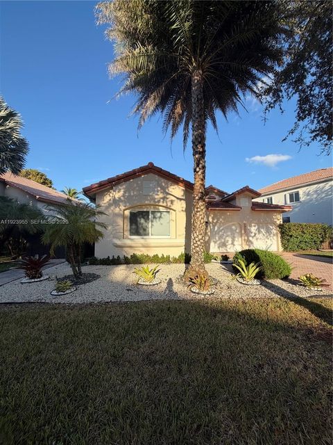 Miami-Dade County 55+ Properties for sale 30 5907 NW 110th Ct Doral FL 33178