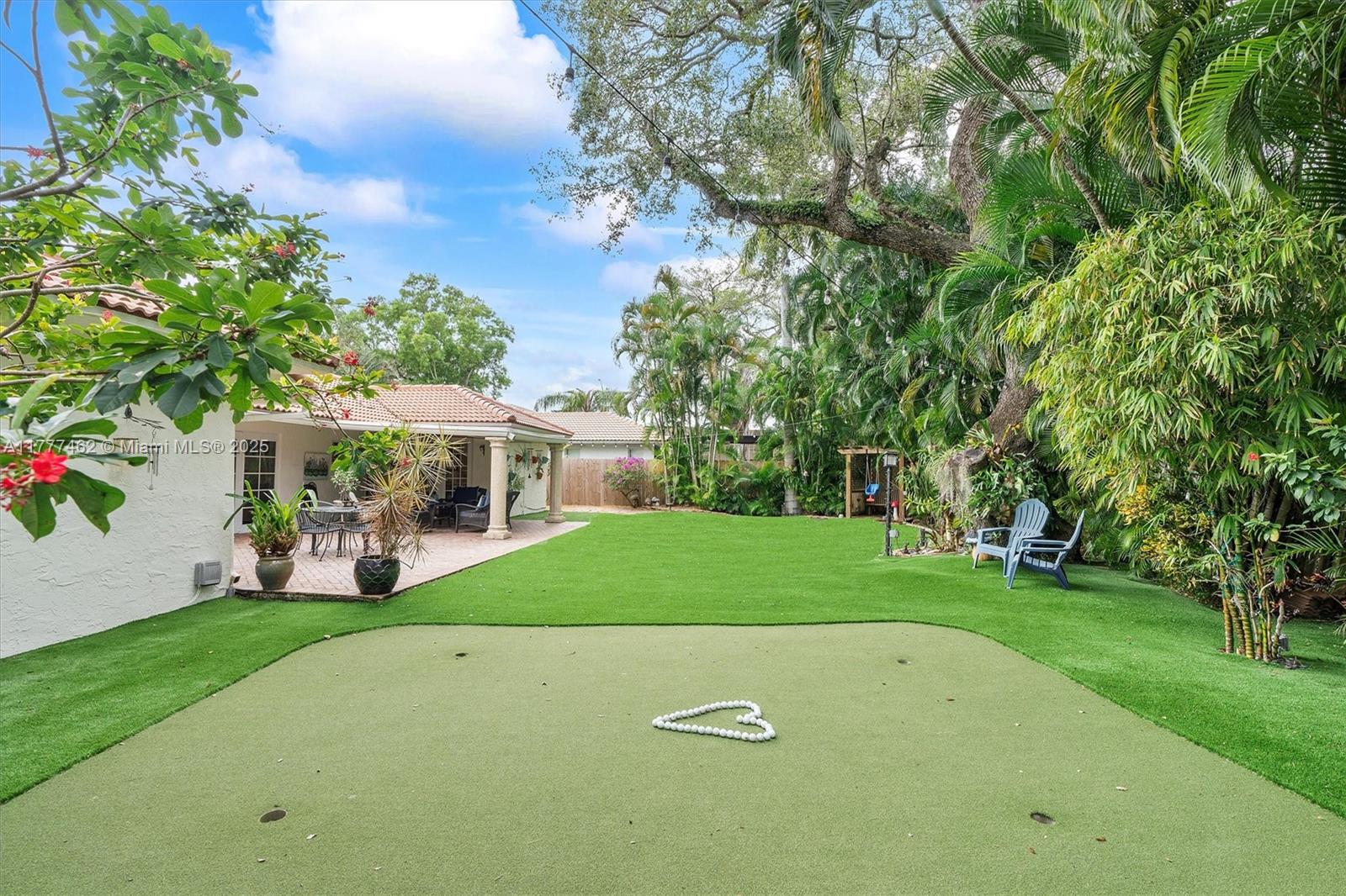 GORGEOUS, meticulously kept, lushly landscaped designed home in Highland Gardens. TURNKEY! Original owner, who has kept the home in pristine condition. Brand new generator that will maintain full electricity for 10+ days ($50,000). Brand new AC, front doors, water heater, refrigerator/freezer, and dishwasher. Hurricane Impact Windows and Doors throughout. Backyard fully astro turf with golf putting green. Private cul-de-sac street with no traffic. Only 6 houses on the cul-de-sac. Perfect for children. Barrel roof. Double guard gate - one for Highland Lakes, one for Highland Gardens. No HOA. Halfway point between downtown Miami and downtown Fort Lauderdale. 1.5 miles from the heart of Aventura and Aventura Mall. Very close to schools and houses of worship