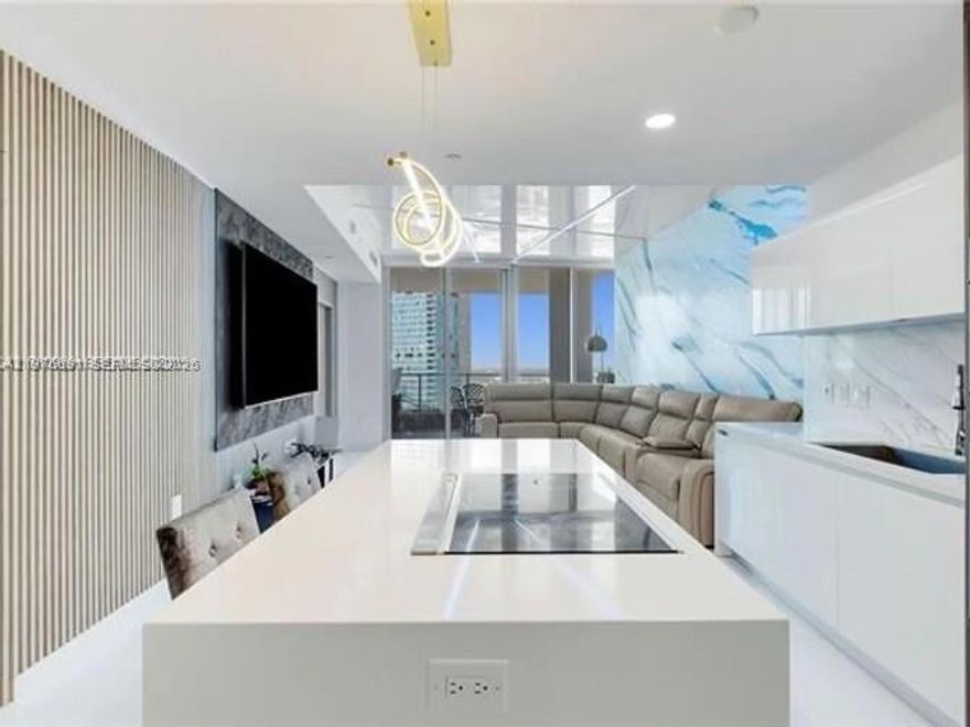 Experience elevated urban living at Paramount Miami Worldcenter in the heart of Downtown Miami. This beautifully remodeled 1-bedroom, 2-bath residence has been thoughtfully customized by the owner with upgraded finishes and refined design details throughout. The spacious layout offers an open-concept living and dining area, a modernized kitchen with premium appliances, and a generously sized primary suite complemented by a full second bath, ideal for guests or a home office setup.
Paramount Miami Worldcenter is known for its unmatched amenities, offering one of the most robust lifestyle experiences in the city. Residents enjoy multiple resort-style pools, a state-of-the-art fitness center, spa facilities, tennis and basketball courts, soccer field, boxing studio, game room, golf simulator, and more - all within a secure, luxury high-rise setting.
Located steps from shopping, dining, entertainment, and just minutes from Brickell, Wynwood, Miami Beach, and the airport, this residence offers the perfect blend of comfort, style, and convenience in one of Miami’s most dynamic neighborhoods.