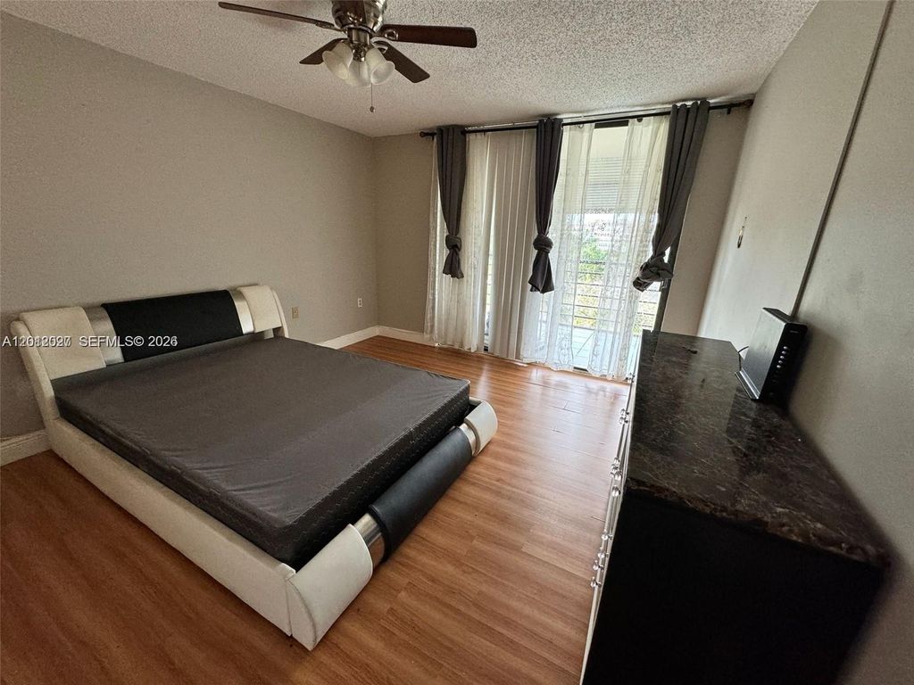 Photo of 1100 Saint Charles Pl #606, Pembroke Pines, FL 33026 (MLS # A12012027)