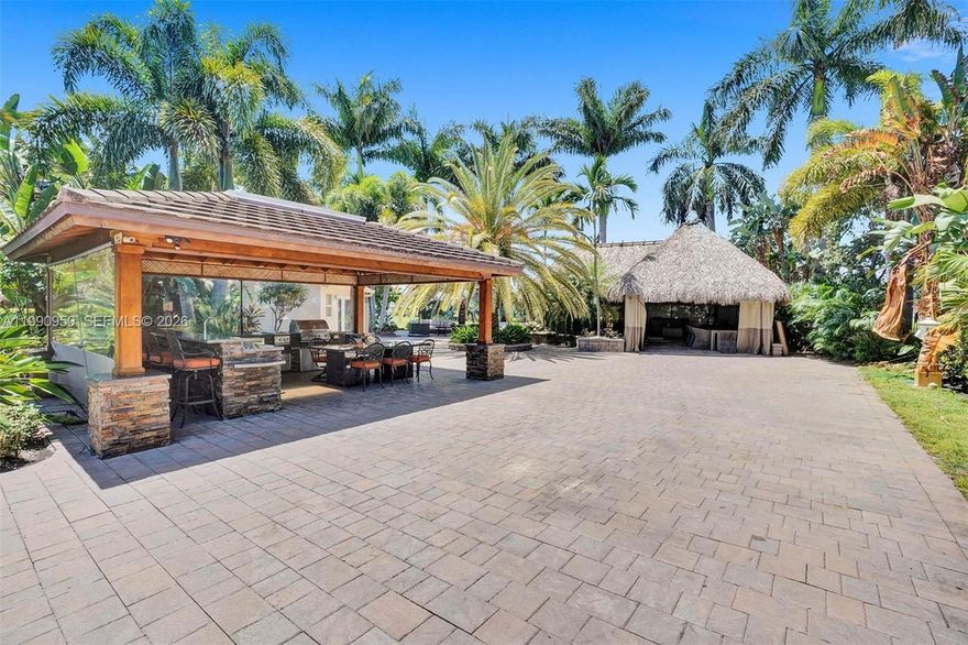 Probably the BEST lot in the AZTEC Luxury RV Resort Park community! Boasting its 8099 sq ft with only one neighbor to its right side, this oversize lot features an L shape Tiki with tile floor throughout, an Outside separate kitchen with granite counter top, concrete cement amenities cabana with full Washer/dryer, bathroom. Lot is neighbour to the bike path so very quiet. Paved driveway for CLass A RV that is a pre-requsite. Newly renovated pools and amenities, Fitness center, shuffleboard, pickelball, Bocci, putting green! Some furniture will convey. This a must see lot and park that looks and feels like real luxury should feel!