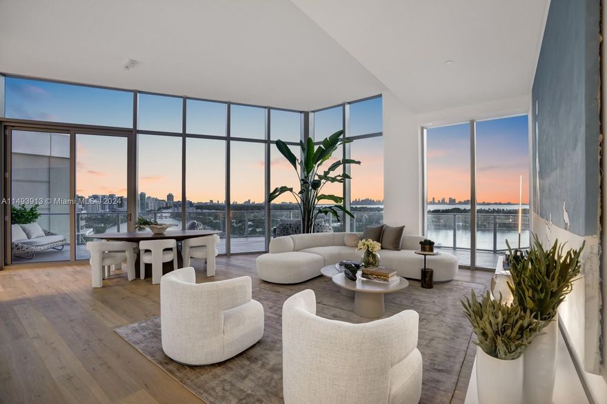 Experience the epitome of lavish living at the Monaco Yacht Club in Miami Beach, where luxury meets panoramic perfection. This penthouse, the crown jewel of a 39 unit boutique building envisioned by renowned architect Piero Lissoni, showcases sophistication and comfort across 2,539 sqft of meticulously crafted interior space. The 13ft floor-to-ceiling windows frame a breathtaking unobstructed view of the Miami skyline, Biscayne Bay sunsets, & Atlantic Ocean sunrises. Indulge in your private 2,888 sqft outdoor terrace, featuring a spa pool and outdoor shower. World-class amenities, fitness center, concierge services, and a marina for yacht enthusiasts. Positioned in a prime location, this is not just a residence; it's a gateway to vibrant nightlife, cultural richness, and pristine beaches.