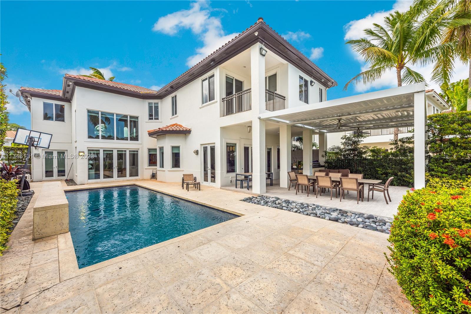 Welcome to this stunning contemporary oasis in the gated community of Presidential Estates. This magnificent property is ready to move in and features an ideal family floor plan with 6 bedrooms, 6 1/2 bathrooms and over 5,000 Sq Ft of living space including a studio, wine cellar, office and a maid’s quarter . You are greeted by a grand foyer with soaring ceilings and an open floor plan that seamlessly flows from the formal living room to the formal dining room. The home sits upon an oversized lot of 10,662 Sq Ft with an oversized backyard oasis that is perfect for entertaining with an oversized pool, summer kitchen and a covered back yard roof. Premium interior finishes includes an Italian kitchen, top of the line appliances, Italian tile flooring, electric blinds and smart systems.