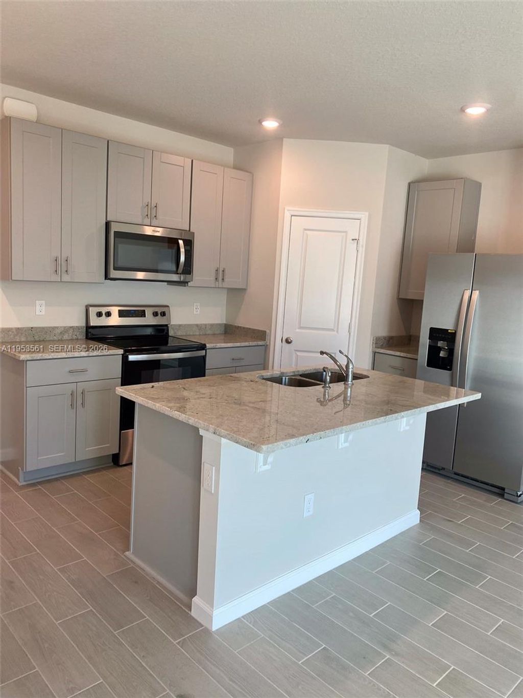 Photo of 5629 Mentmore Dr #0, Mangonia Park, FL 33407 (MLS # A11953561)