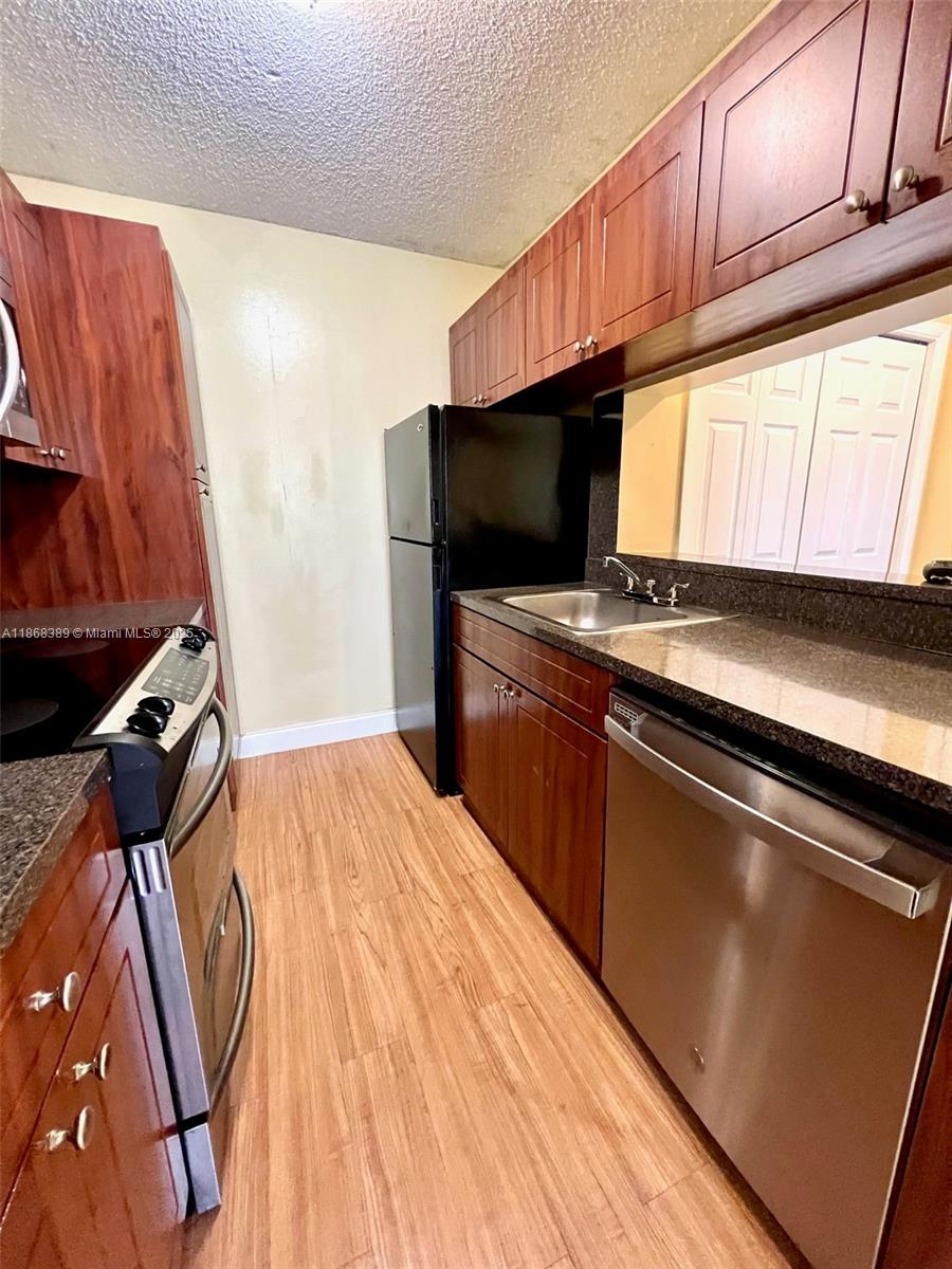 PALM AIRE GARDENS CONDO - Residential Lease