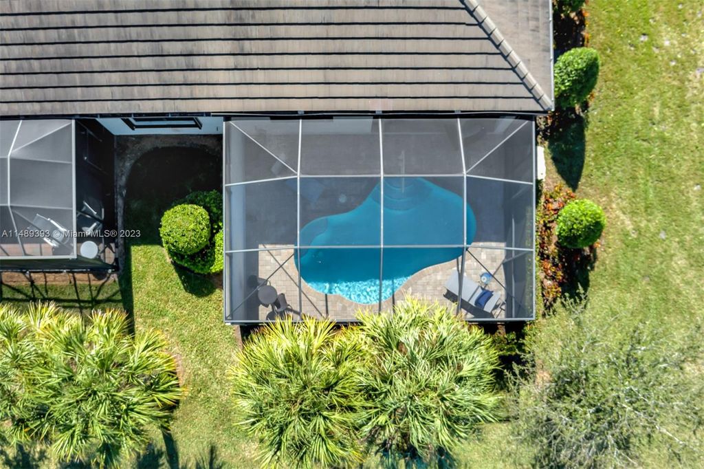 Photo of 4490 Beauty Leaf Cir, Vero Beach, FL 32967 (MLS # A11489393)