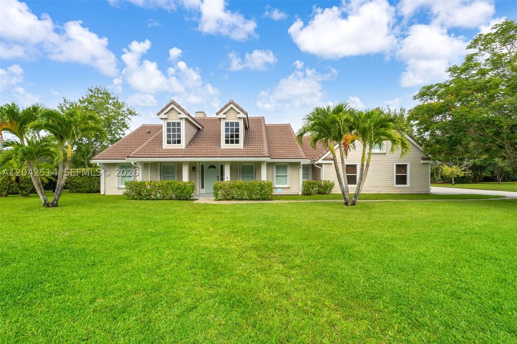 Photo of 5703 Lago Del Sol Dr, Lake Worth, FL 33449 (MLS # A12042514)
