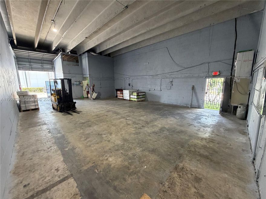 Exceptional flex warehouse space with two-story office, ideally located just off Palmetto Expressway and Okeechobee Rd. Approx. 1,675 sq. ft. of office space plus 150 sq. ft. mezzanine. Features include 100% central A/C, 18'2" ceiling height, 18'H x 10'2"W bay door, bathroom with shower, storage, server room, and conference area. Upstairs includes a spacious executive office. Alarm system in place. Unit is in excellent condition. Perfect for auto dealer, paint shop, wholesale, sign/print company, and more.