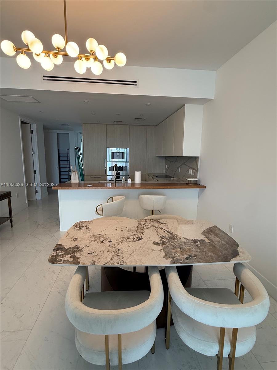 15701 COLLINS CONDO - Residential Lease