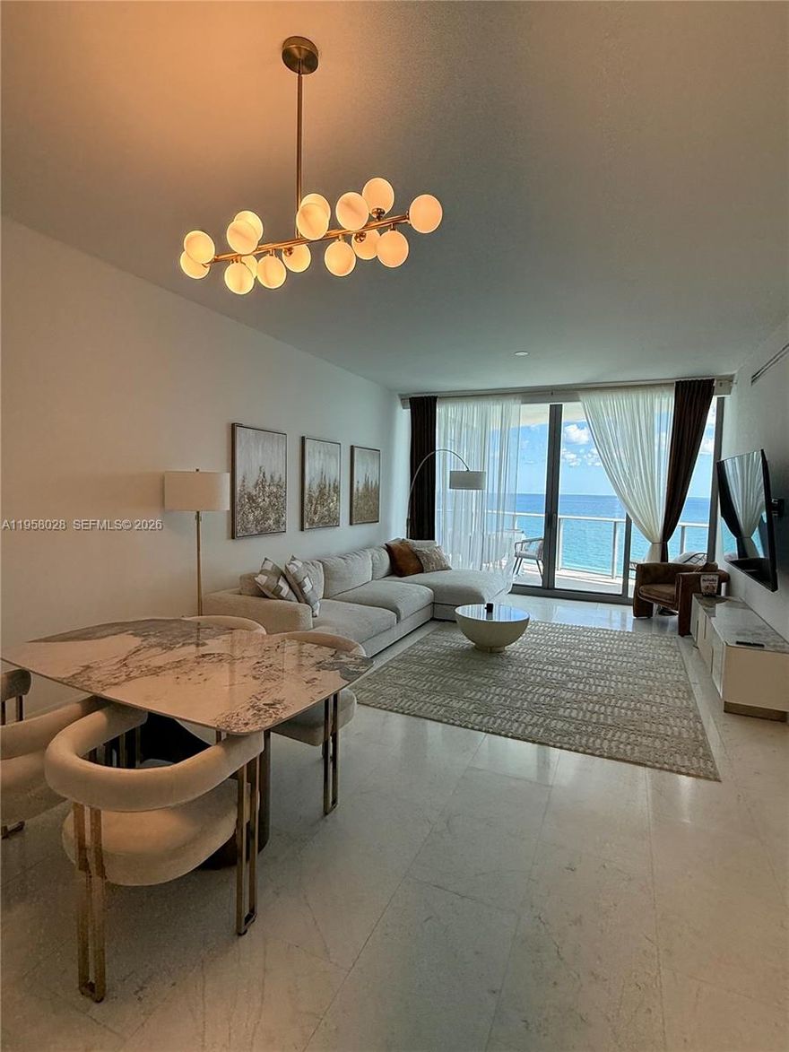 This beautiful furnished 2 bedroom apartment is located in famous Ritz-Carlton Residences in Sunny Isles. Building offers a range of world-class amenities and exclusive services. Residents can enjoy a private beach, a beachfront restaurant, a pool deck with cabanas, a spa and wellness center, a state-of-the-art fitness center, a business center, a kids' club, and multiple social and entertainment spaces. The unit features high-end finishes, designer kitchen, top-of-the-line appliances, elegant bathrooms, panoramic floor-to-ceiling windows and premium fixtures and fittings. It is equipped with smart home technology, providing an advanced automation and security features. Don't miss an opportunity to live in this sophisticated luxurious development.