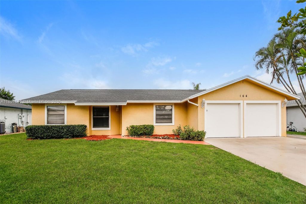 Photo of 164 Santa Monica Ave, Royal Palm Beach, FL 33411 (MLS # A11897640)
