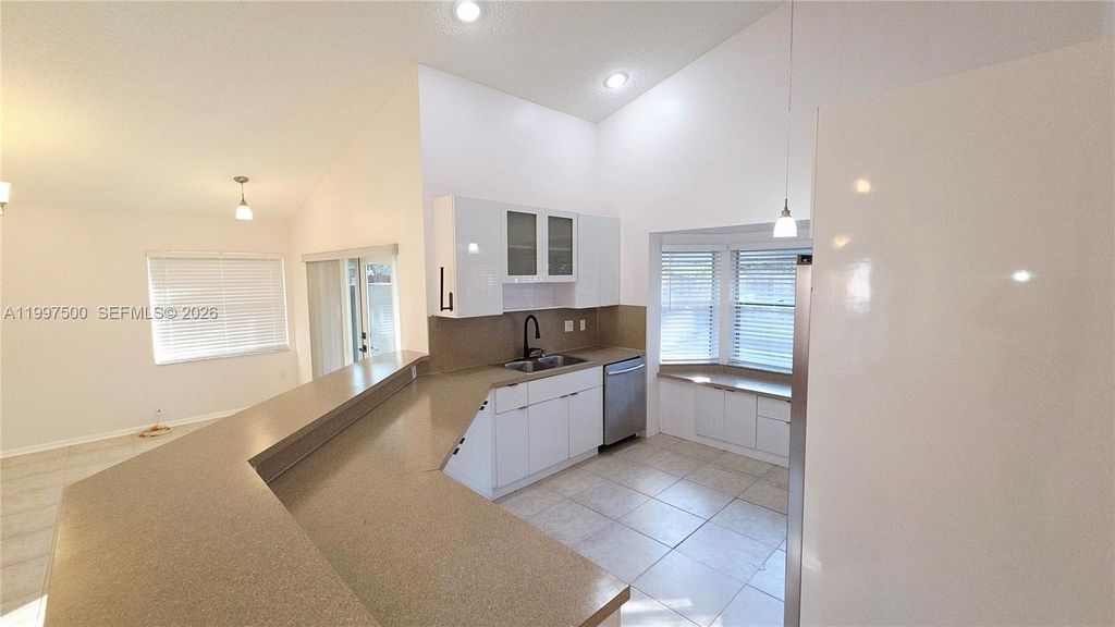 Photo of 3247 NW 123rd Ave, Sunrise, FL 33323 (MLS # A11997500)