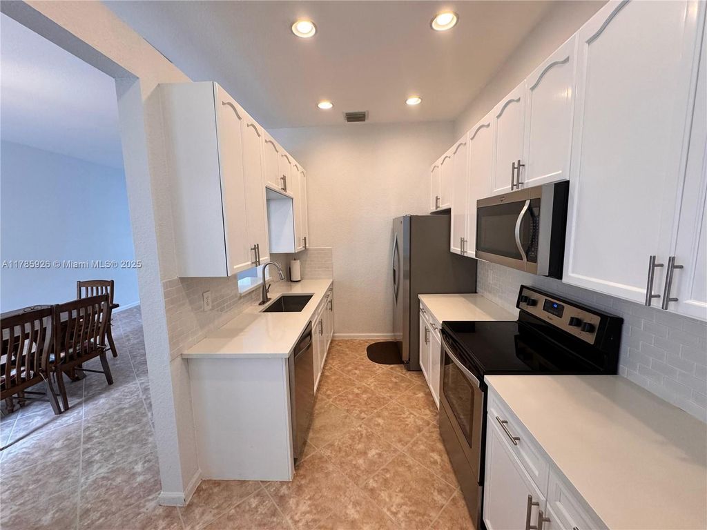 Photo of 412 NW 24th Ave #412, Boynton Beach, FL 33426 (MLS # A11785926)