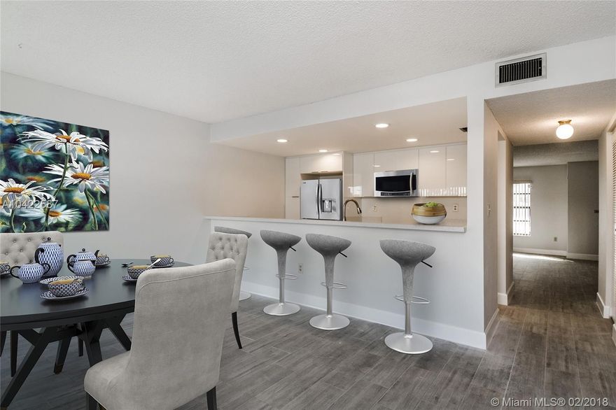 Newly renovated, spacious, turn-key townhouse features 1,480 sq. ft. of living space and is ready for its new owner! With new wood tile floors throughout and a completely renovated Galley style kitchen and modern bathrooms, this townhouse is sure to impress. Lots of storage and your master bedroom features a large walk-in closet, open balcony and en-suite bathroom. Second bathroom upstairs for guest bedrooms is completely remodeled with a fresh modern look as well. Located in the community of Saga Bay at desirable Cutler Bay, this home is a few minutes drive to supermarkets, local restaurants great schools, and Cutler Bay's main town center. Low monthly HOA fee and FHA approved! Do not wait. This remodeled townhouse won't last. Easy to show.