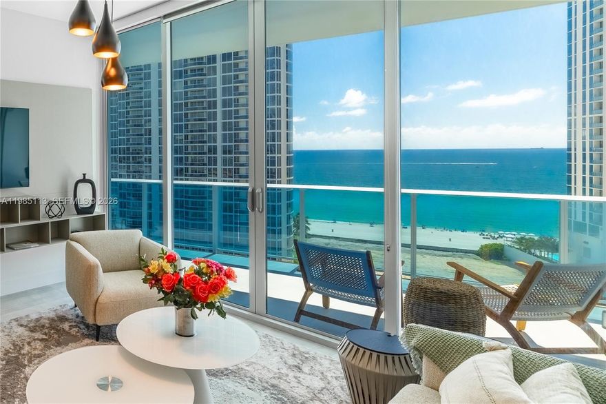 In Sunny Isles Beach, also known as Florida's Riviera with its crystal-clear ocean and sandy beaches, this beautiful designer-furnished 2-bedroom + den, 2.5-bath home is available for seasonal or long-term rental. Wake up to breathtaking sunrises from the oversized balcony accessible from every room, or relax inside and take in captivating 180 views of the Atlantic Ocean and Sunny Isles skyline. A private elevator opens to the hallway of this elegant residence, which features spacious built-in closets, high-end appliances, a fully stocked kitchen, and shades with blackouts for complete privacy. Enjoy resort-style amenities including a gym, kids' room, business center, 24-hour front desk, and security.