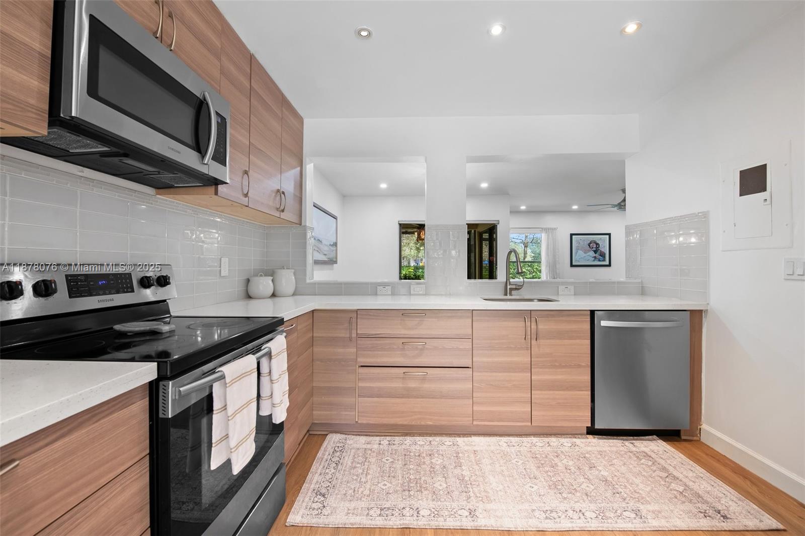 SELLER MOTIVATED! Charming Townhome in Coconut Creek! Welcome to this beautifully renovated 3-beds, 2.5-baths townhome in the sought-after Golden Raintree III community. This spacious 1,447 SF townhome boasts a bright, open-concept layout with stylish tile flooring, a modern kitchen, & a cozy living space perfect for entertaining. Upstairs, you’ll find generously sized bedrooms, including a tranquil primary suite with a private en-suite bath. Step outside to enjoy your own patio, ideal for relaxing. Plus, you'll have access to top-tier amenities, including a clubhouse, basketball courts, & a community room! Conveniently located near top-rated schools, shopping, dining, and parks. Don't miss out on this incredible opportunity—schedule your private tour today!