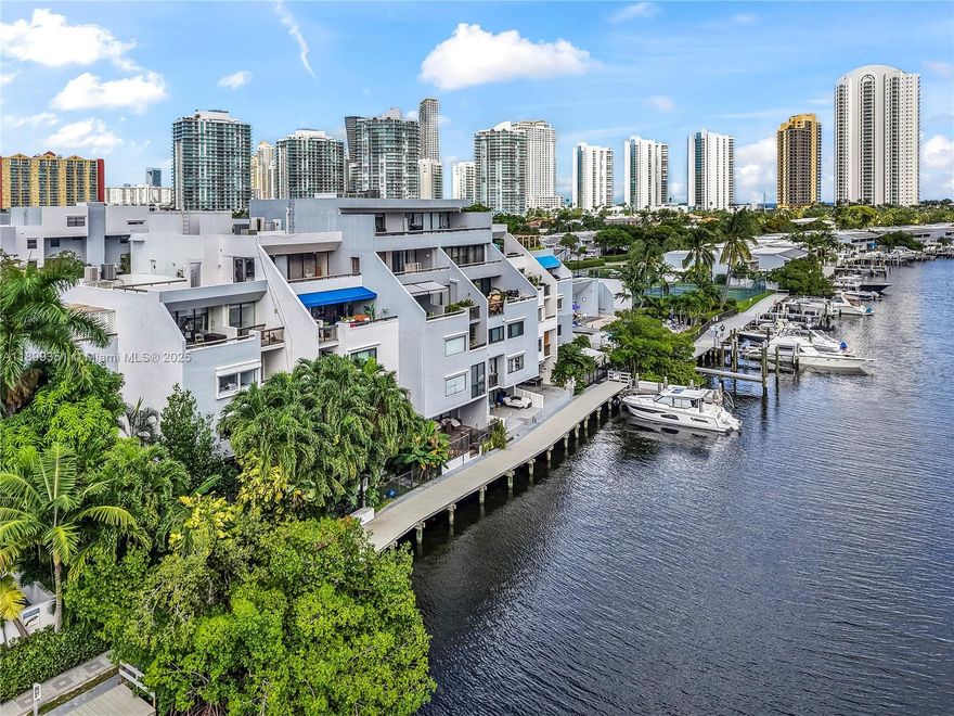 Unique Corner Waterfront Home–Largest on Poinciana Island With Room To Expand!Walking distance to the beach&access to intracoastal&the ocean with no fixed bridges. 
Experience unmatched luxury in this oversized 2 story 5bed,3bath in guard-gated community.With 3,115 SF of interior space and almost 800 SF private garden with koi pond,this home offers the privacy&feel of a single-family residence in a resort-style setting. 
Resort-style pool, clubhouse, marina, gym,children’s play area, tennis courts etc.
An exceptional opportunity to reimagine and elevate a property with limitless potential.
Whether you're a boating enthusiast, growing family, or simply seeking something unique — this is the pinnacle of island living in Sunny Isles.