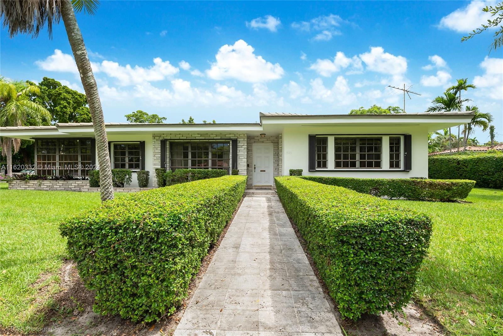 Discover the perfect home on a spacious 13,000 sq. ft. corner lot in a prime Coral Gables location. This charming residence boasts 3 bedrooms and 2 bathrooms, with 2 car garage ideal for family living. A generous family room, living room, formal dining room, eat in kitchen, and an additional sunroom offer versatile spaces for entertainment, work, or relaxation. The oversized lot provides ample outdoor space, with plenty of room for a pool and landscaping possibilities. Enjoy the convenience and appeal of this well-situated property, offering both comfort and potential for future enhancements. This is a rare opportunity to own a large corner lot in a desirable area, combining both indoor and outdoor living at its finest. Don’t miss your chance to make this exceptional property your home.