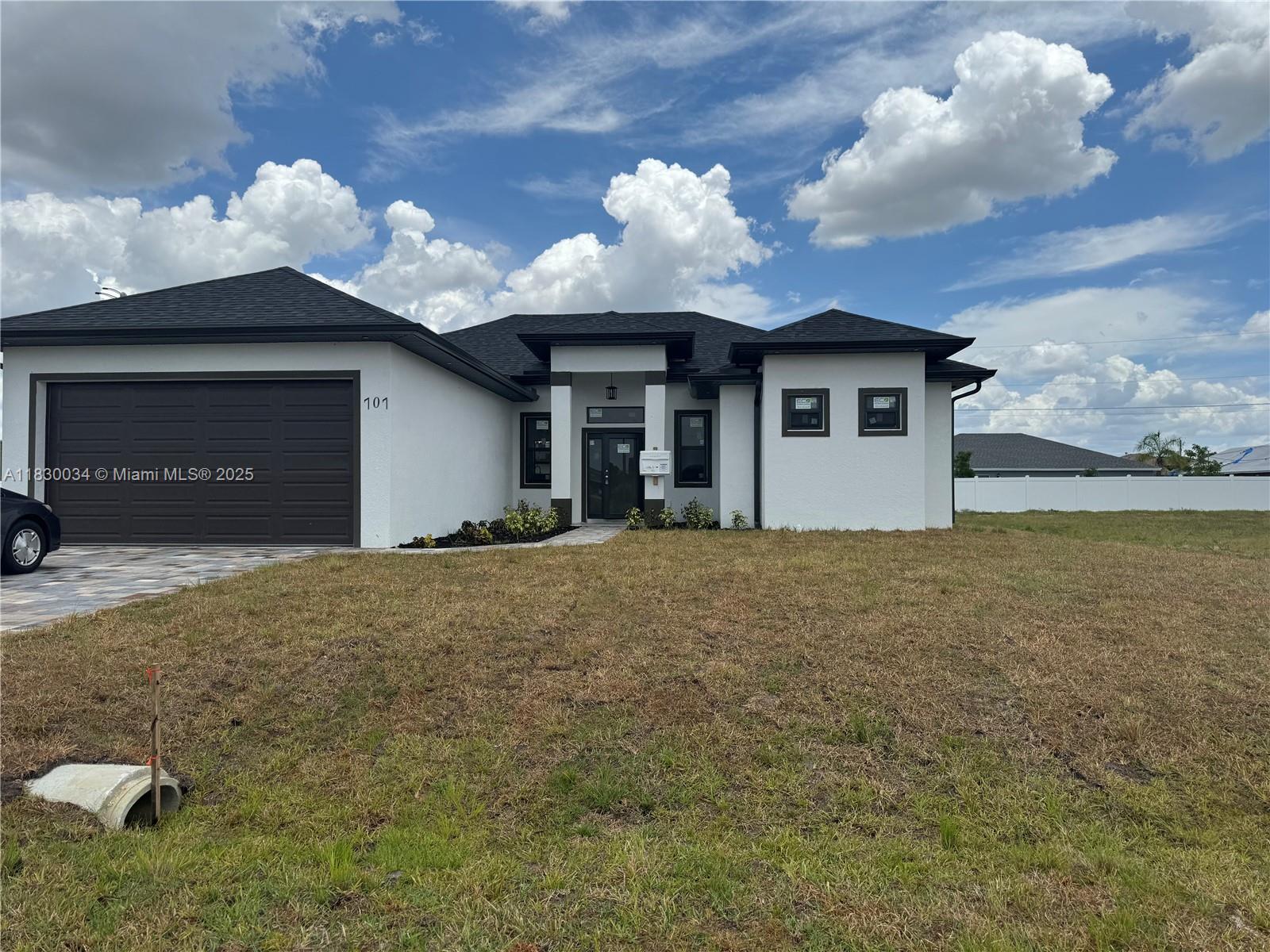 BEAUTIFUL BRAND NEW HOME !!! EXCELLENT LOCATION THE MOST DESIRABLE AREA, IN A QUIET NEIGHBORHOOD, MODERN STYLE IN CAPE CORAL FLORIDA WITH 3 BEDROOMS, 2 BATHROOMS, 2 CAR GARAGE. HIGH IMPACT WINDOWS AND DOORS.. TILES THROUGHOUT PLENTY ROOM FOR A POOL. THIS HOME IS READY TO MOVE AND WAITING FOR FAMILY TO ENJOY THE AROMA OF A NEW HOME!!! PLEASE CALL OR TEXT LISTING AGENT FOR THE APPOINTMENT. WATER IS CONNECTED TO THE CITY.