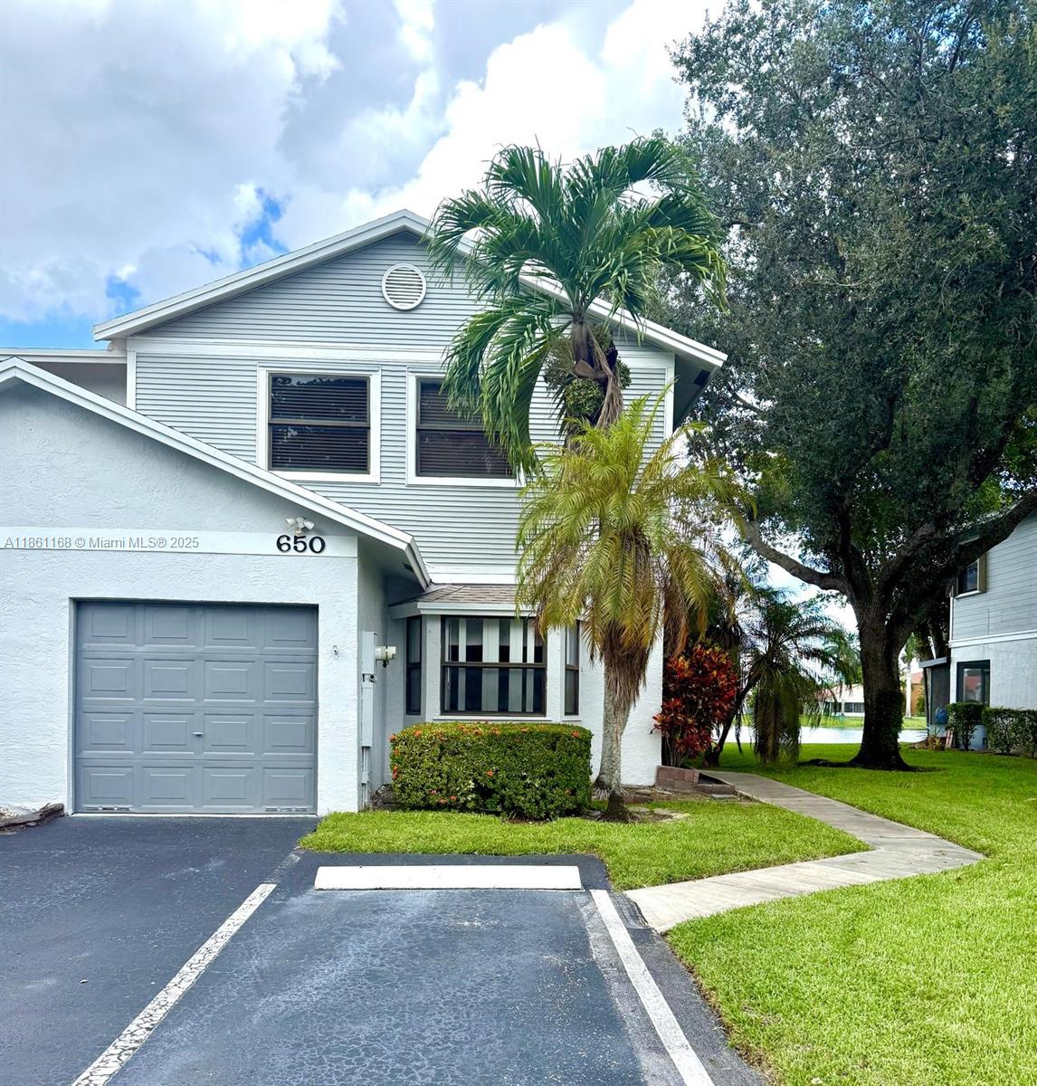This charming corner townhome offers 3 bedrooms, two & half bathrooms, a spacious screened patio, & a spectacular view of the lake. Enjoy peace of mind with a new roof & freshly painted exterior. Enjoy resort-style living with a fantastic amenities, including a pool, tennis & pickleball courts, a playground, & an events room for special gatherings. Perfectly located, you can walk to Pembroke Pines City Center for dining, shopping, & city events, as well as nearby public & charter schools, grocery stores, dog & children's park, & the golf course. The association covers the roof, exterior insurance, care of common grounds, cable, & internet—giving you more time to relax & enjoy the beautiful lake view. Property may be rented in the first year. Great as a primary home or investment.