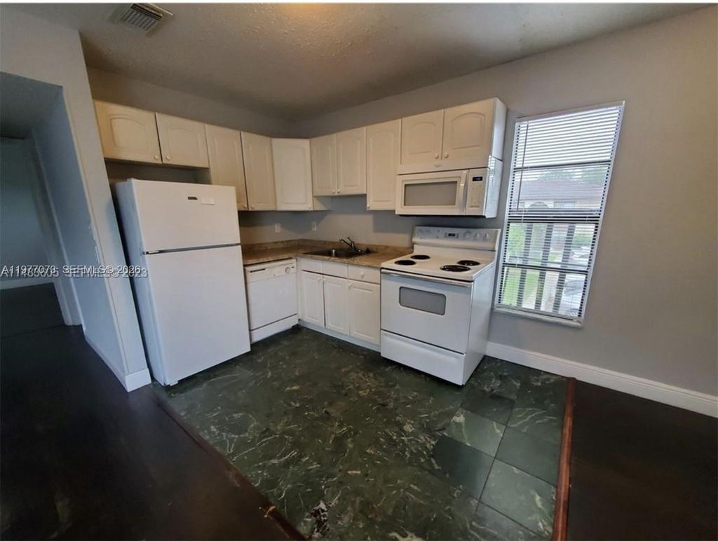 Photo of 3006 Coral Ridge Dr #210B, Coral Springs, FL 33065 (MLS # A11977073)