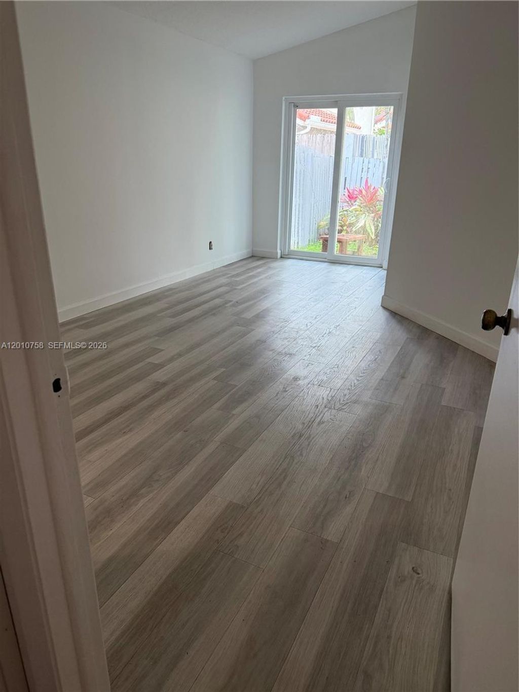 Photo of 1407 Seagrape Cir, Weston, FL 33326 (MLS # A12010758)