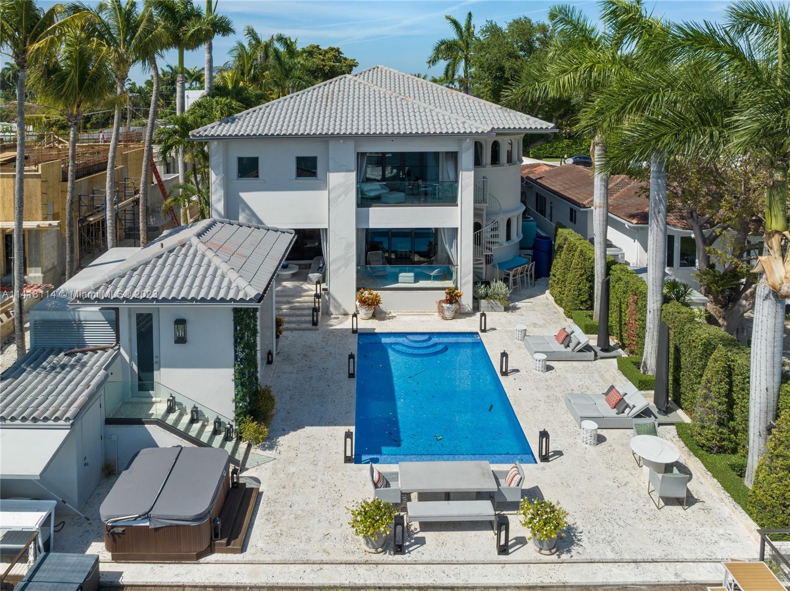 Spectacular newly renovated private waterfront Home. Â Located in the prestigious Hibiscus Island, Miami Beach Florida. This home features expansive indoor/ outdoor concept, 5 ensuite bedrooms & 6.5 baths, this home boasts unparalleled comfort and elegance. Main master bedroom w/sitting area & spacious walk-in closets, modern ensuite bath. Large kitchen with top of the line appliances, a separate Breakfast bar and built-in seating area. Â 60 ft waterfront Boat dock (12,000 and 25, 000 pound lift ). A beautiful large heated salt water pool, hot tub, summer kitchen and ample space to entertain. A must see and so much more!!!