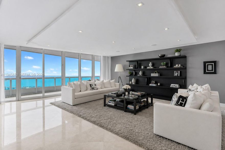 Experience refined waterfront living at Santa Maria, one of Brickell’s most prestigious buildings. This fully renovated 4,030 sq ft residence with over 1,000 sq ft of balcony space offers a 4-bedroom, 5.5-bath flow-through layout, private foyer, and elevator entry with stunning, unobstructed views of the ocean, bay, and Miami skyline. Expansive north- and west-facing terraces fill the home with natural light. Features include a Veneta kitchen with premium appliances, elegant wood and marble flooring, his-and-hers closets, and a spa bath overlooking the bay. Enjoy resort-style amenities—24-hour security, fitness center, pool, tennis, racquetball, marina access, and a prime Brickell lifestyle