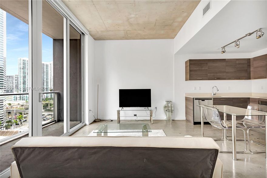 Stunning Studio apartment is the perfect place for anyone looking to experience city life in downtown Miami. With
high ceilings and polished concrete floors, you'll be delighted by the modern and chic feel of this unit. Enjoy
incredible views from your private balcony of both the city and partial water views. The building offers a range of
amenities including a rooftop pool, fitness center, sauna, lounge & social room all designed by renowned designer
Yves Behar. The home comes complete with stainless steel appliances plus a front-loading washer & dryer. To make life even easier there's free high-speed 400 Mbps internet included as well as Apple TV with over 120 basic
channels! Just a few blocks away from American Airlines Arena, Bayside Marketplace, and Brickell City Centre.