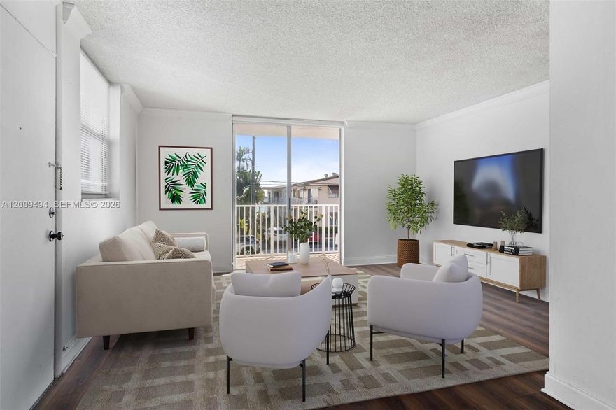Price improvent for cash buyer only. Corner unit with renovated 2-bedroom, 2-bath residence on the 2nd floor of North Bay Village's sought-after waterfront enclave is move-in ready. The fully updated kitchen features quartz countertops, stainless steel appliances, and a designer tile backsplash.  Resort-style amenities include a waterfront heated pool, fitness center, 24/7 security patrol, and lush tropical gardens. One attached garage parking space included.