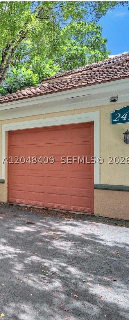 Photo of 2439 Centergate Dr #103, Miramar, FL 33025 (MLS # A12048409)