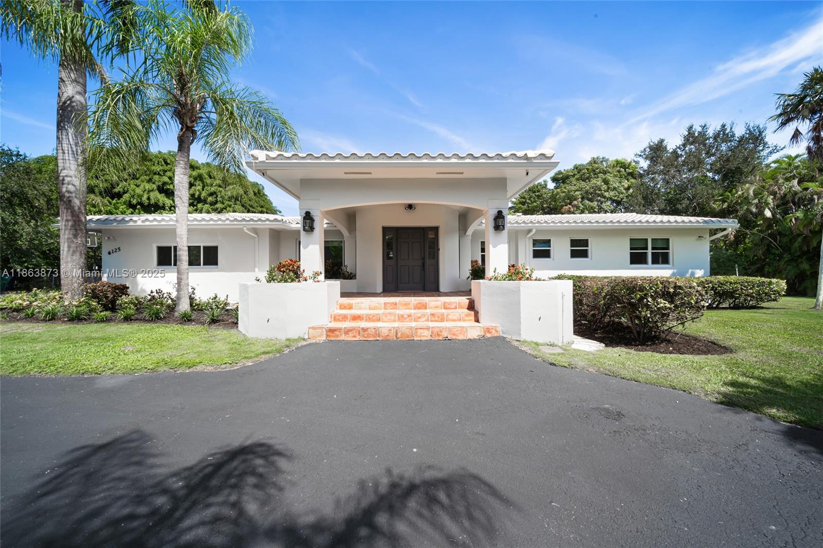 Nestled on a quiet, tree-lined street in North Pinecrest, this 5-bedroom, 5-bathroom home offers the perfect blend of space, comfort, and privacy. Situated on a beautifully landscaped one-acre lot, the property features spacious living areas, a thoughtfully designed layout, and serene outdoor spaces—including a sparkling pool perfect for relaxing or entertaining. Additional highlights include impact windows throughout, providing peace of mind and energy efficiency. Whether you’re looking for room to grow or a private retreat, this home delivers. Don’t miss this rare opportunity to own a slice of paradise in one of Pinecrest’s most desirable neighborhoods.