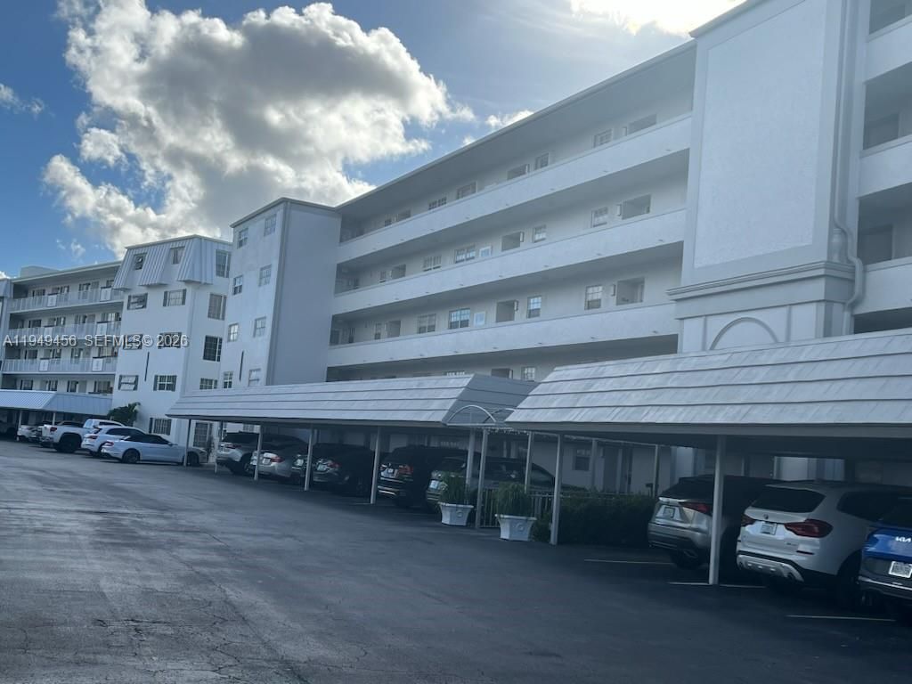 Photo of 250 John F Kennedy Dr #303, Atlantis, FL 33462 (MLS # A11949456)