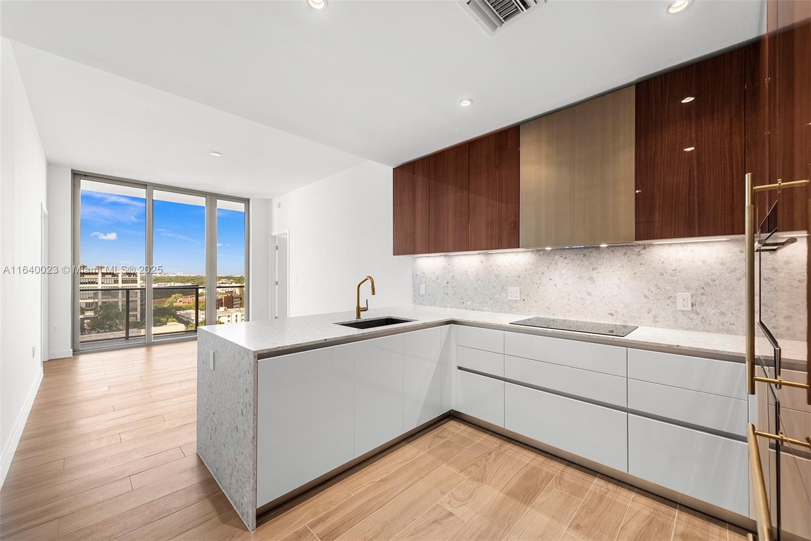 Welcome to Mr. C Residences, a luxurious retreat in the heart of Coconut Grove. This 2 bedroom floor plan offers sweeping views of the canopy tree tops, tall ceilings for ample natural light along with a custom Italian kitchen featuring Sub Zero Wolf appliances and terrazzo countertops. Upgrades include custom closets, modern blackout & sheer shades and a glass door for the tub. The building offers unparalleled luxury and service w/ 5 star amenities & staffed to ensure every need is met with precision & care. Enjoy the panoramic rooftop pool, gym, spa, concierge & butler services as well as an onsite restaurant called Le Specialita. Marinas, parks, grocery stores, restaurants & shops are just minutes away!