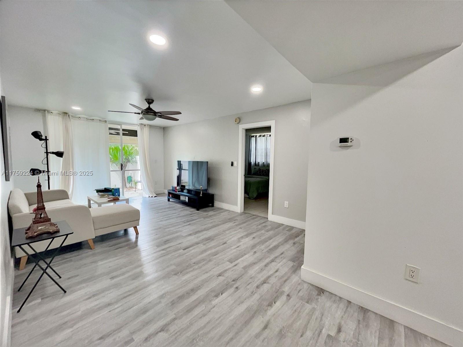 FIRST FLOOR CORNER UNIT WITH PRIVATE BACKYARD. LOW HOA- Private Outdoor Courtyard. No pending assessments. Features: Corner Unit, Updated kitchen, Split bedroom Floor Plan, Private Outdoor Courtyard, No popcorn ceilings in social areas, updated ceiling lights, Waterproof vinyl floors & Tiles. Community amenities: clubhouse, 2 pools, tennis courts, sauna, gym & jacuzzi. HOA includes water, hot water, Pest control, exterior insurance, landscaping, amenities.