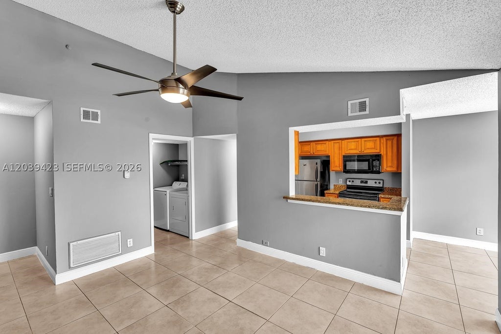 Photo of 5740 Rock Island Rd #299, Tamarac, FL 33319 (MLS # A12039423)
