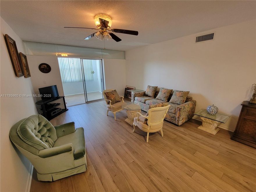 **GREAT PROPERTY ALERT** Located in a beautiful 55+ community that offers plenty of amenities. Beautiful laminate floors throughout! Won't last!