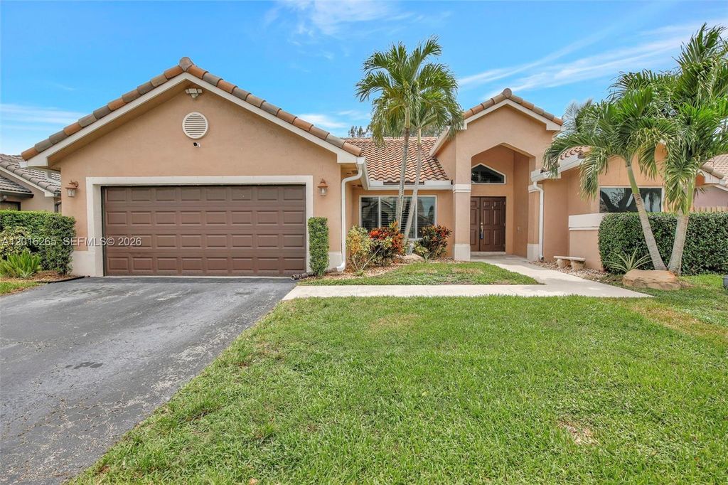 Photo of 12486 SW 9th Pl, Davie, FL 33325 (MLS # A12016265)