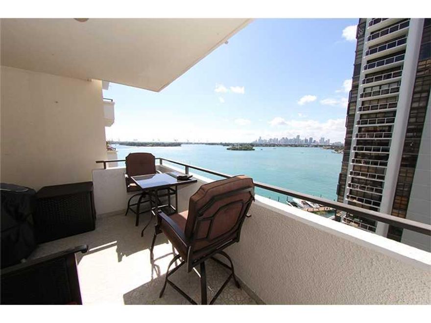 Beutiful bay/downtown views from this spacious west facing light fillled unit.  Second bedroom opens to living room-perfect for at home office. Great building with many amenities-gym, pool, marina , doorman and, only steps away from SoBe's stellar beaches , restaurants, shopping etc.  NO washer/dryer in the unit-but conveniently located steps away. Small, well behaved pets considered.